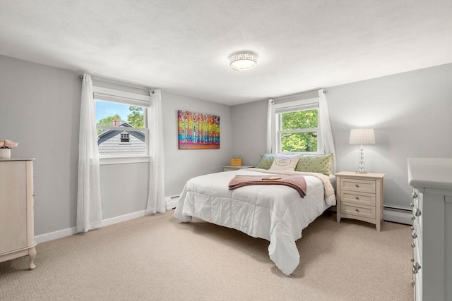 150 Academy St, Braintree, MA 02184 - bedroom with a baseboard radiator, light colored carpet, a baseboard heating unit, and baseboards