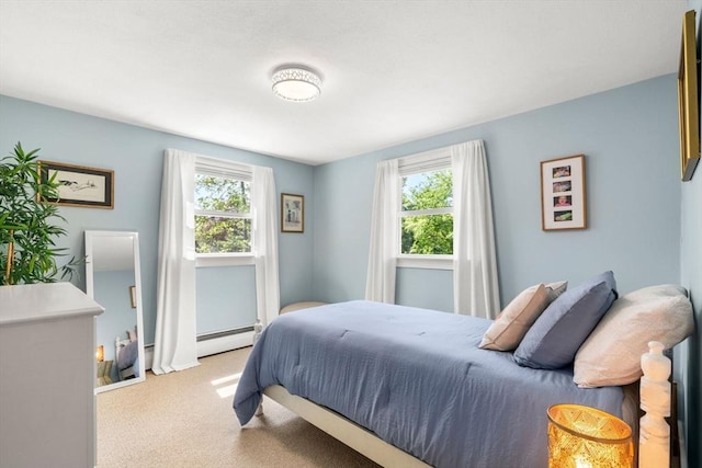 150 Academy St, Braintree, MA 02184 - carpeted bedroom with a baseboard heating unit