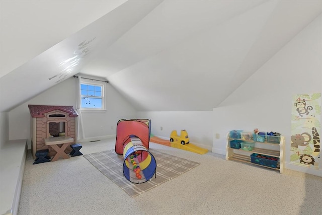 rec room with lofted ceiling, carpet flooring, and baseboards