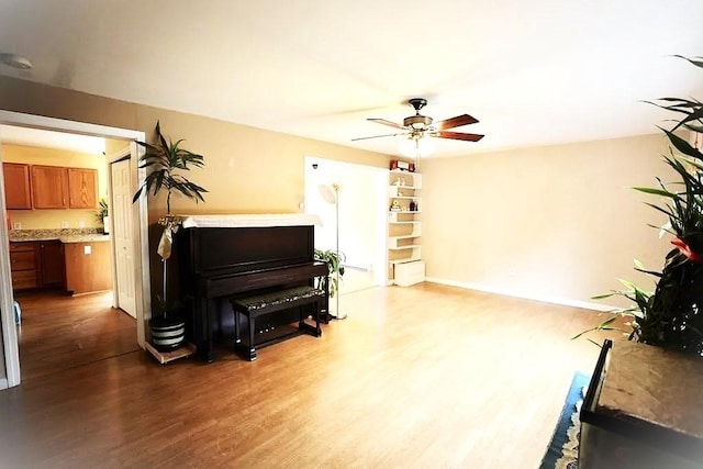 167 Orient St, Worcester, MA 01604 - living area with wood finished floors and a ceiling fan
