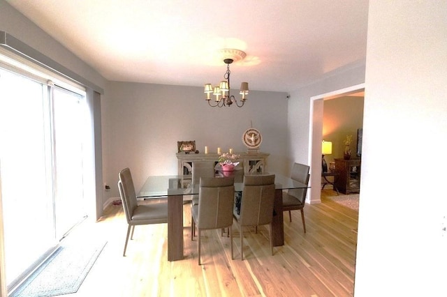 167 Orient St, Worcester, MA 01604 - dining space with a chandelier, healthy amount of natural light, and light wood-style floors