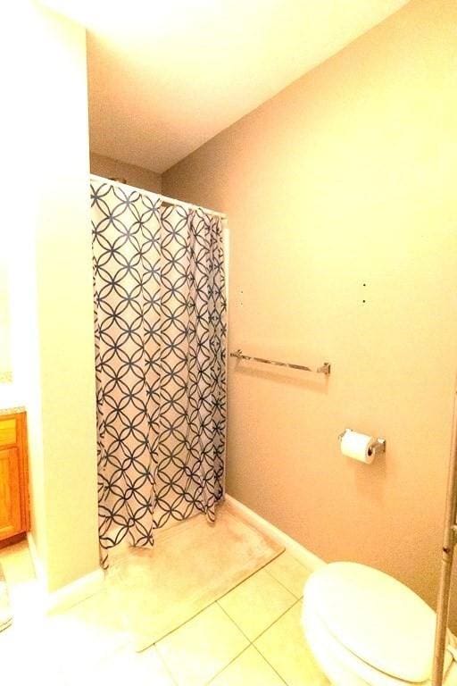 167 Orient St, Worcester, MA 01604 - full bathroom featuring a shower with curtain, vanity, and tile patterned floors