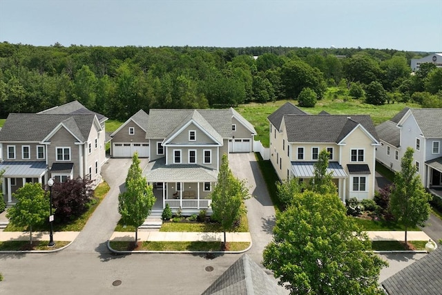 82 Snowbird Ave, Weymouth, MA 02190 - aerial perspective of suburban area featuring a heavily wooded area
