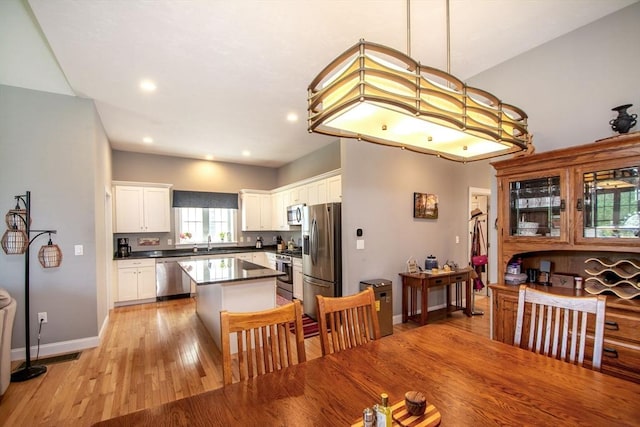 82 Snowbird Ave, Weymouth, MA 02190 - dining space featuring light wood-style flooring and recessed lighting