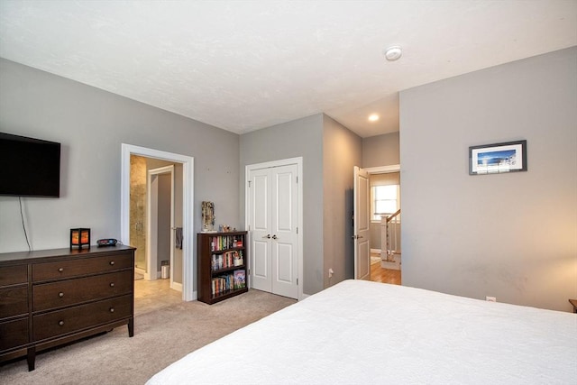 82 Snowbird Ave, Weymouth, MA 02190 - bedroom with light carpet, a closet, connected bathroom, and recessed lighting