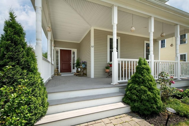 82 Snowbird Ave, Weymouth, MA 02190 - property entrance with a porch
