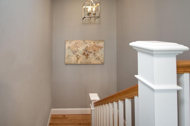 82 Snowbird Ave, Weymouth, MA 02190 - stairs featuring wood finished floors and a chandelier