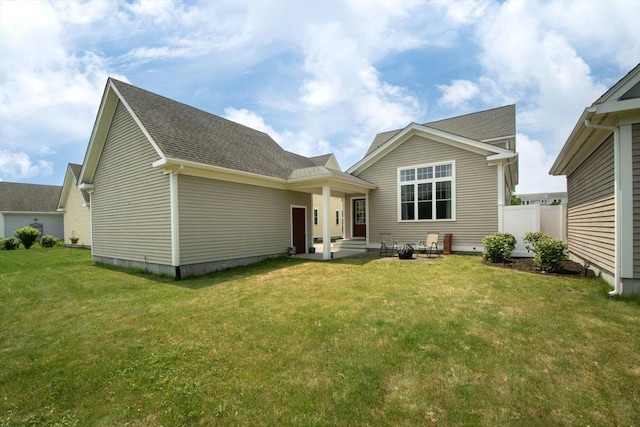 82 Snowbird Ave, Weymouth, MA 02190 - back of house featuring a shingled roof and a patio area