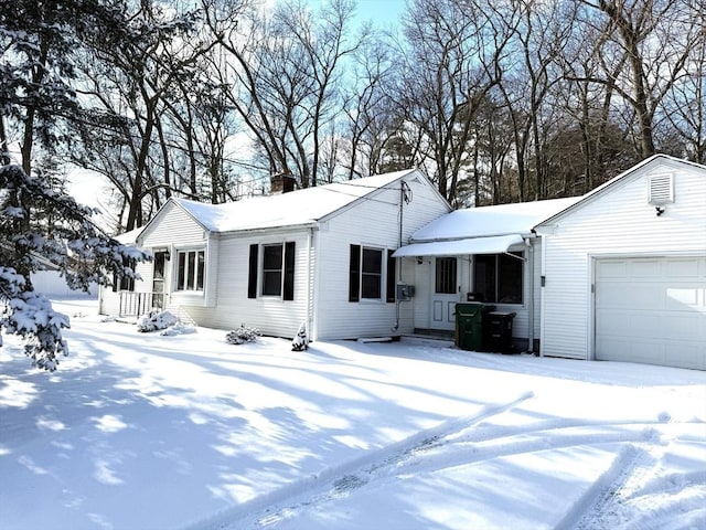 single story home featuring a garage