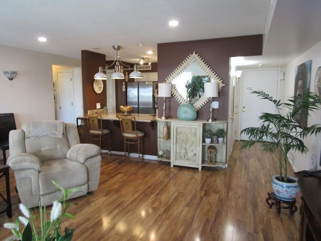 50 S Common St Unit 311, Lynn, MA 01902 - living area with wood finished floors and recessed lighting
