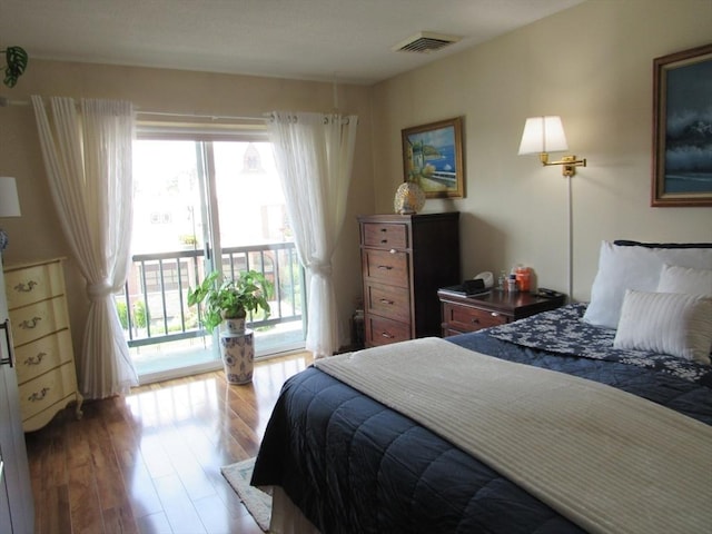 50 S Common St Unit 311, Lynn, MA 01902 - bedroom featuring access to exterior and wood finished floors