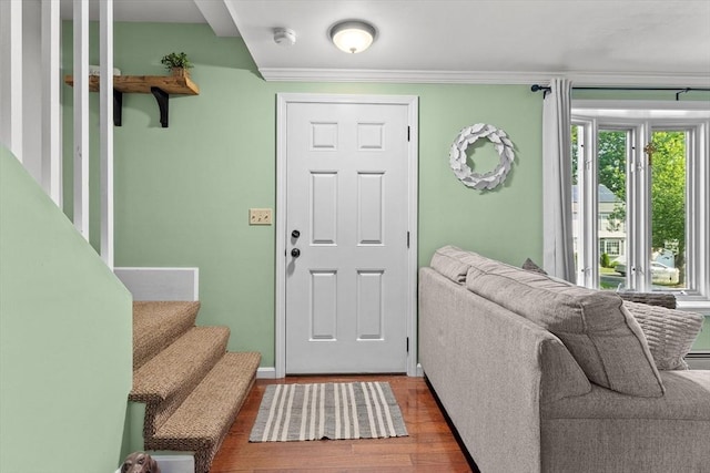 39 Taylor St Unit 39, Haverhill, MA 01830 - foyer featuring wood finished floors, ornamental molding, and stairway