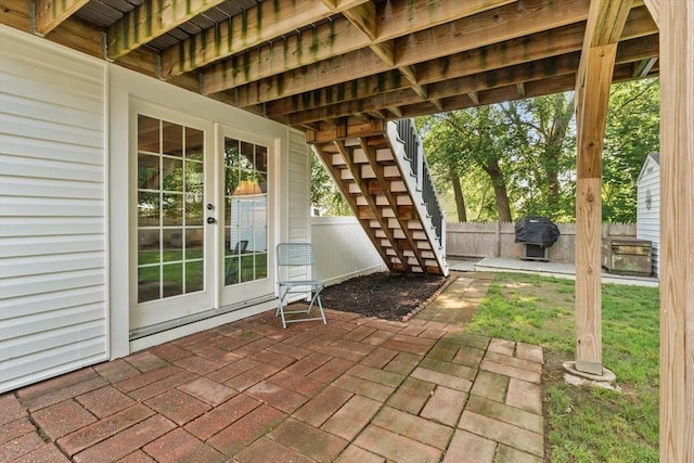 39 Taylor St Unit 39, Haverhill, MA 01830 - view of patio / terrace with stairway, french doors, and grilling area