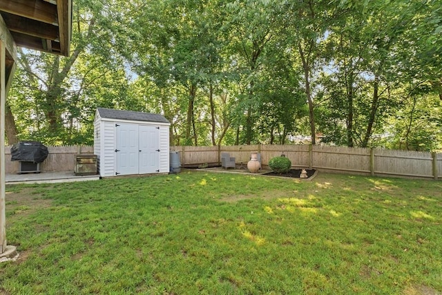 39 Taylor St Unit 39, Haverhill, MA 01830 - fenced backyard featuring a storage unit and view of scattered trees