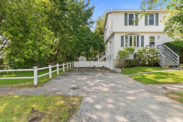 39 Taylor St Unit 39, Haverhill, MA 01830 - view of front of property featuring driveway and stairway