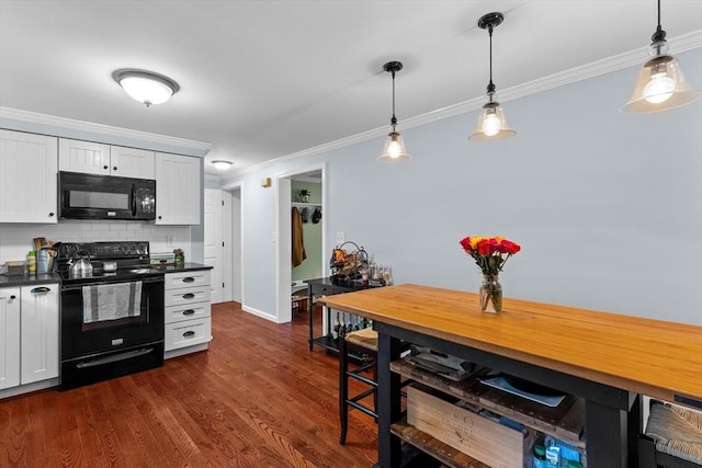 39 Taylor St Unit 39, Haverhill, MA 01830 - kitchen featuring black appliances, dark countertops, crown molding, pendant lighting, and decorative backsplash