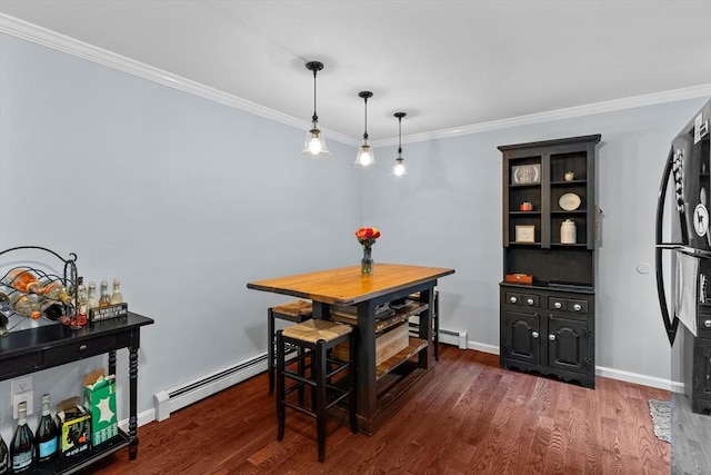 39 Taylor St Unit 39, Haverhill, MA 01830 - dining room with a baseboard heating unit, wood finished floors, and ornamental molding
