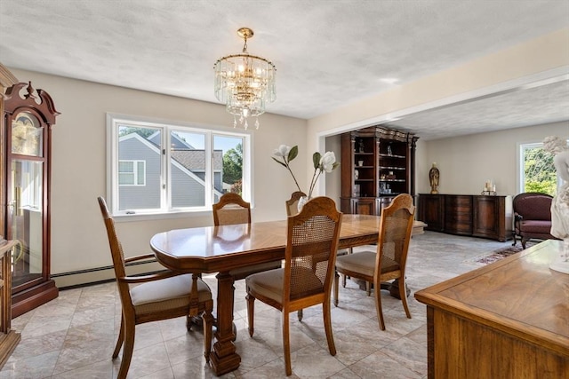 6 Gavin Cir, Stoneham, MA 02180 - dining area with a baseboard heating unit and a chandelier