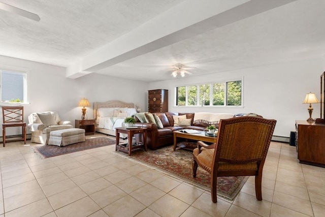 6 Gavin Cir, Stoneham, MA 02180 - living area with ceiling fan, a baseboard heating unit, and light tile patterned flooring
