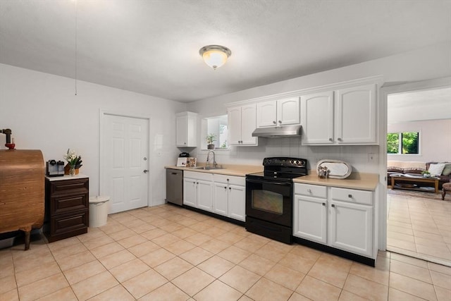 6 Gavin Cir, Stoneham, MA 02180 - kitchen with black electric range, under cabinet range hood, stainless steel dishwasher, light countertops, and white cabinets