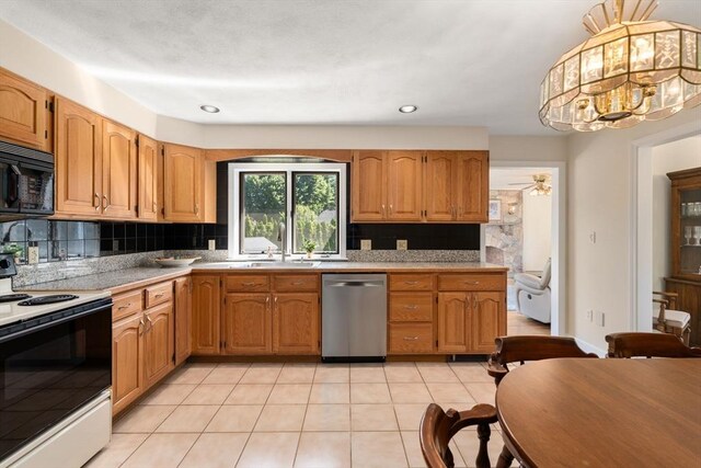 6 Gavin Cir, Stoneham, MA 02180 - kitchen with dishwasher, electric range, black microwave, tasteful backsplash, and light tile patterned flooring