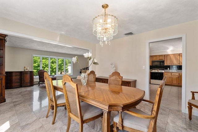6 Gavin Cir, Stoneham, MA 02180 - dining space featuring a chandelier and baseboards