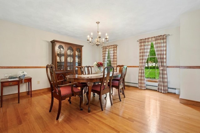 8 Adams Rd, Grafton, MA 01519 - dining room with a chandelier, light wood-style flooring, and baseboards