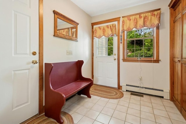 8 Adams Rd, Grafton, MA 01519 - entryway featuring a baseboard heating unit and light tile patterned floors