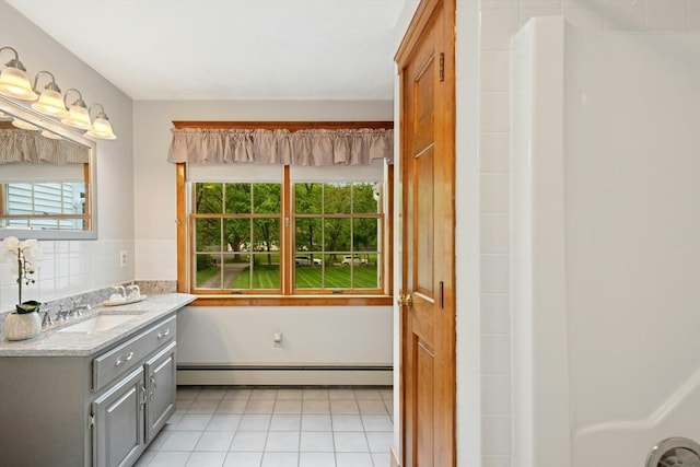 8 Adams Rd, Grafton, MA 01519 - bathroom with a baseboard radiator, vanity, and tile patterned flooring