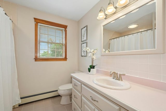8 Adams Rd, Grafton, MA 01519 - bathroom featuring baseboard heating, vanity, toilet, tasteful backsplash, and tile patterned flooring