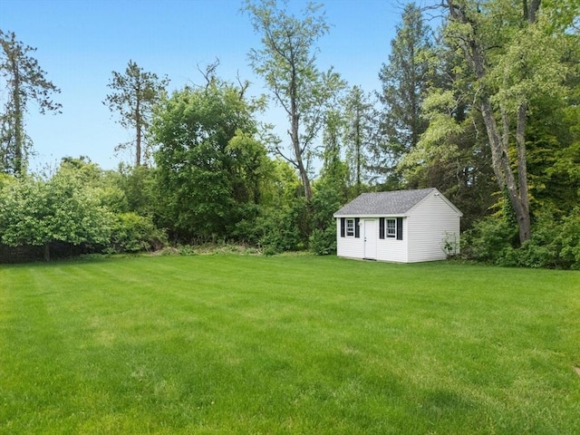8 Adams Rd, Grafton, MA 01519 - view of green lawn with an outdoor structure
