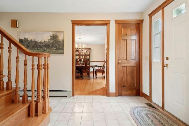 8 Adams Rd, Grafton, MA 01519 - entryway with stairs, a chandelier, baseboard heating, and light tile patterned floors