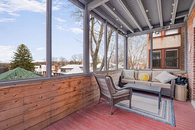 sunroom / solarium with outdoor lounge area
