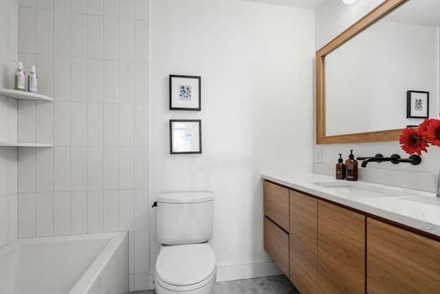 full bath with toilet, vanity, and baseboards