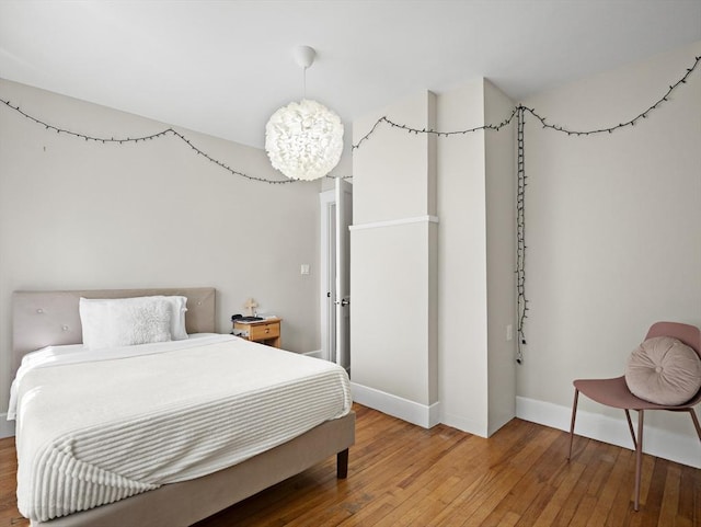 537 Milk St, Fitchburg, MA 01420 - bedroom featuring hardwood / wood-style floors and baseboards