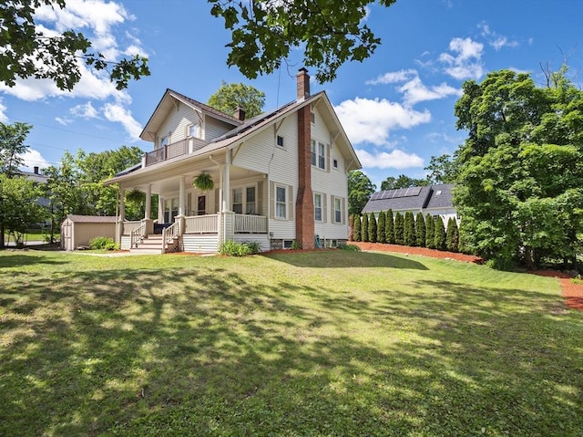 537 Milk St, Fitchburg, MA 01420 - view of front of property featuring a chimney, covered porch, and a front lawn