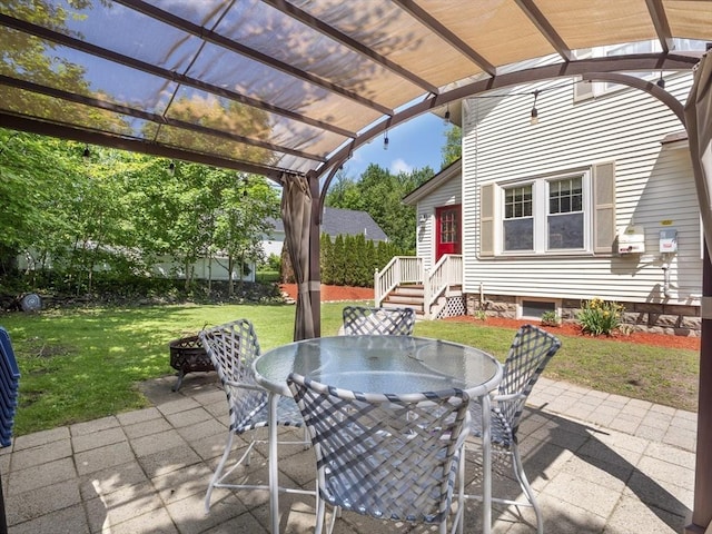 537 Milk St, Fitchburg, MA 01420 - view of patio / terrace featuring outdoor dining space, an outdoor fire pit, and a pergola
