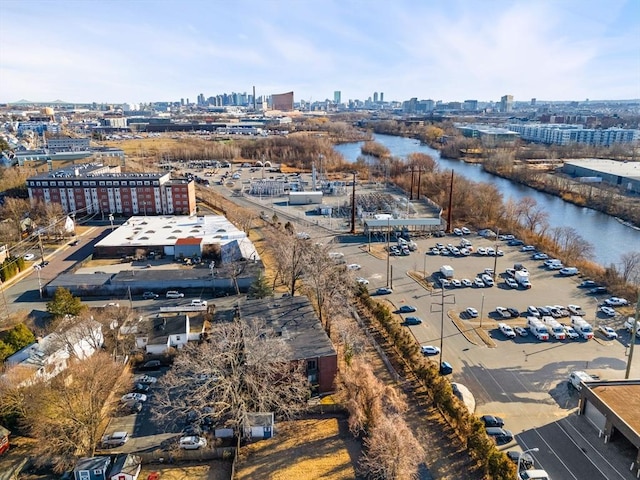 aerial view featuring a view of city and a water view