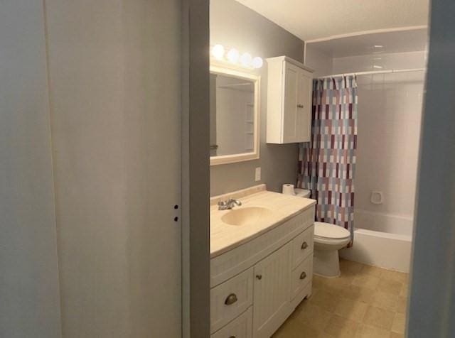 14 Village Way Unit 23, Natick, MA 01760 - bathroom featuring toilet, vanity, and shower / bath combination with curtain