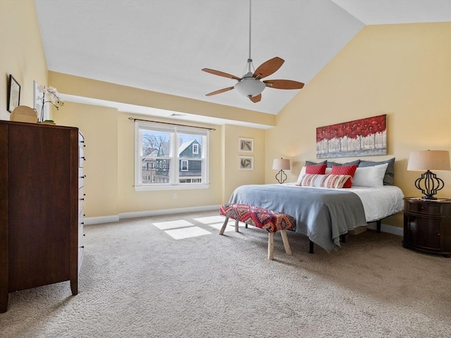 bedroom featuring baseboards, carpet floors, high vaulted ceiling, and ceiling fan