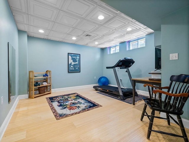 workout room featuring visible vents, recessed lighting, baseboards, and wood finished floors