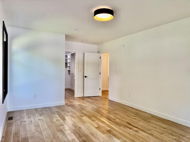 252 Main St Unit 101, Medford, MA 02155 - spare room with light wood-style flooring and baseboards
