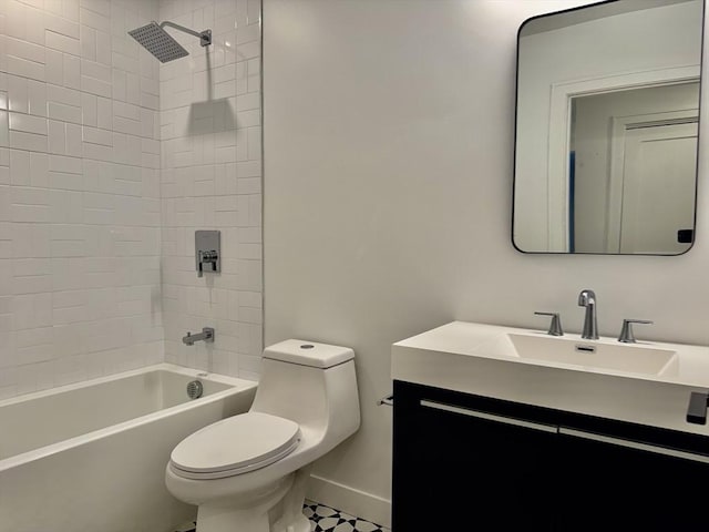 252 Main St Unit 101, Medford, MA 02155 - bathroom featuring toilet, vanity, shower / bathtub combination, and baseboards