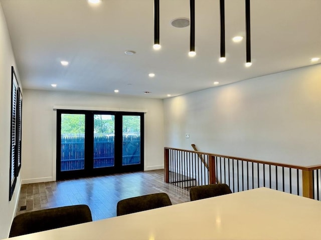 252 Main St Unit 101, Medford, MA 02155 - entrance foyer with wood-type flooring and baseboards