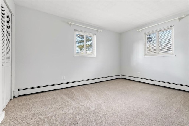 spare room with light colored carpet