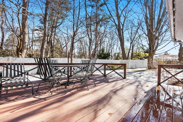 view of snow covered deck