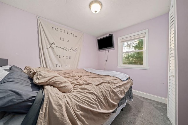 bedroom featuring carpet