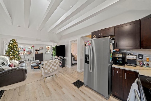 kitchen featuring stove, tasteful backsplash, dark brown cabinetry, light hardwood / wood-style flooring, and stainless steel fridge with ice dispenser