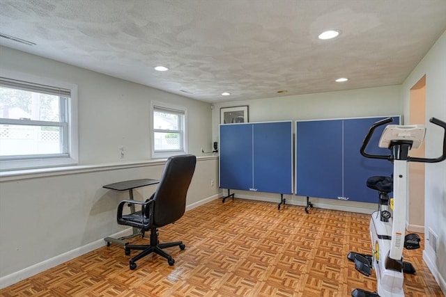 office space featuring baseboards and recessed lighting