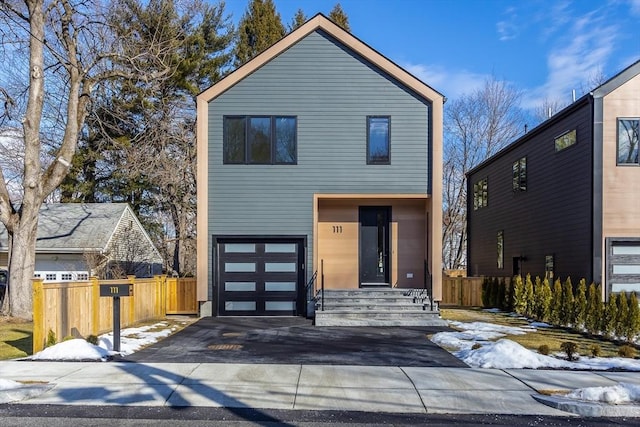 modern home featuring a garage